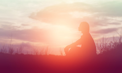 Wall Mural - Sad and depressed woman sitting alone