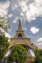 Wall Mural - Eiffel Tower. Paris. France. Famous historical landmark on the quay of a river Seine. Romantic, tourist, architecture symbol. Toned