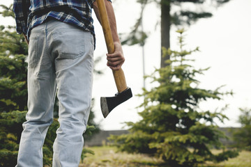 Wall Mural - Man with axe in the forest