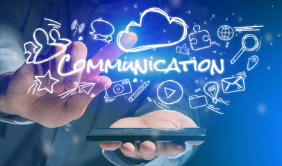 Concept of man holding smartphone with Communication icon around