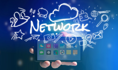Concept of man holding smartphone with network icon around