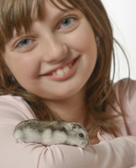 Wall Mural - little girl with little hamster