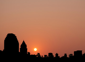 Wall Mural - City / Silhouette of city at sunset. Digital retouch.