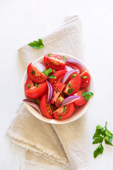 Canvas Print - Tomato salad with onion