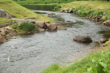 Bend Of The River With Boulders
