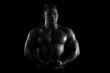 © pucko_ns - Strong young man showing his muscles and exercise