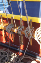 Coiled Rope Lines Stored On Belaying Pins