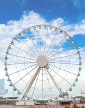 Giant Ferris Wheel In Hong Kong Overlooking Victoria Harbor