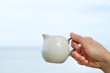 cup in female hand