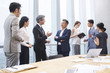 © Blue Jean Images - Business people talking in meeting room