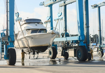 Wall Mural - boat lift out of the water