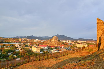 A view of the city of Sudak and the Genoese fortress at sunset