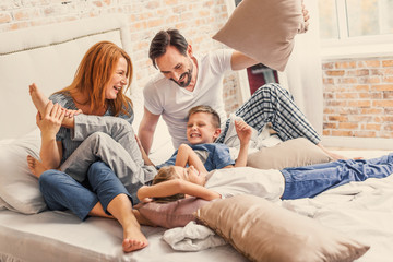 Young family being playful at home