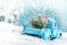 Snow Countryside With Christmas Tree Truck