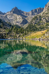 Reflections of Pic de Mar, at Monestero Lake. (Catalonia, Spain).