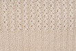 © marinayesina - beige knitted background/ beige knitted background pattern closeup