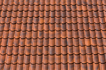 Red tiles roof background