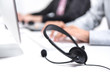 © Atstock Productions - Microphone headset on the table in call center