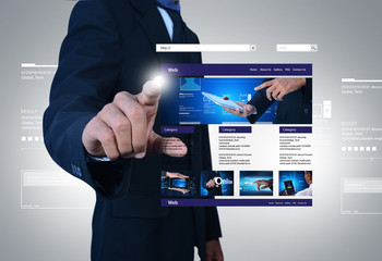 Wall Mural - business man showing web page