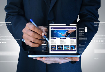Wall Mural - business man showing web page on tablet