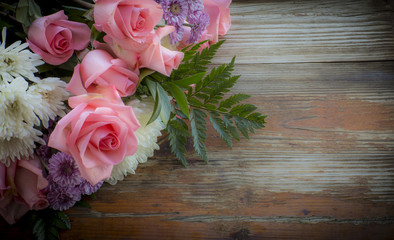 Bouquet Of Flowers On A Rustic Background