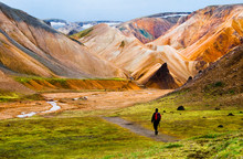 Hiker Walking To Landmannalaugar Mountains, Iceland