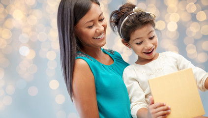 Sticker - happy mother and child girl with gift box