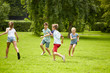 © Syda Productions - happy kids running and playing game outdoors