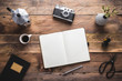 © mallmo - writer, photographer, artist, hipster wooden rustic desk with black notebook, camera, coffee maker and cup of espresso. Flat lay. View from above, copy space.