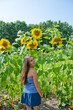 © altana_studio - smiling pretty girl in sunflower
