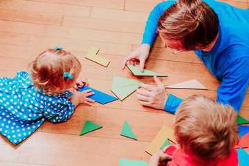 Wall Mural - teacher and kids playing with geometric shapes