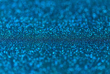 Blue Sparkling Background From Small Sequins, Closeup. Brilliant Backdrop