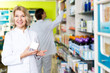 © JackF - Pharmacist and pharmacy technician posing in drugstore