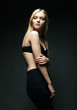 © Raisa Kanareva - pretty fashion model on grey background