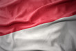 waving colorful flag of indonesia.