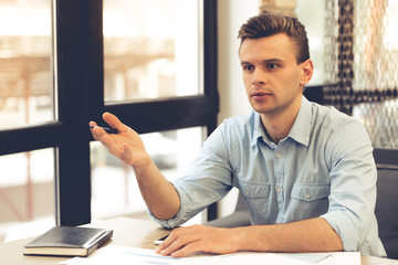 Poster - Young businessman working