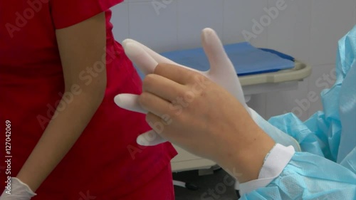 Hand Of Nurse Wearing Rubber Glove Use For Healthy Or Medic Stock