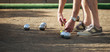 © pavel1964 - Petanque game,measuring the distance, deciding who's the winner