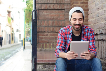 man using a tablet.