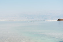 Swimmers In Dead Sea At Ein Bokek, Israel.