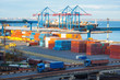 cargo terminal in the sea port wit bridge and trucks