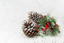 Pinecones And Berries In A Winter Christmas Scene. Copy Space.