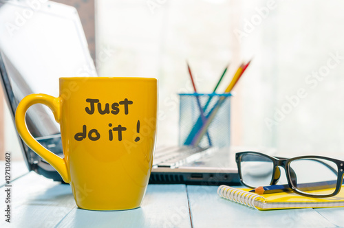 lettering of inspirational quote JUST DO IT on yellow morning coffee or other ho Poster