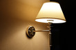 © Arkady Chubykin - Glowing lamp on the wall in hallway