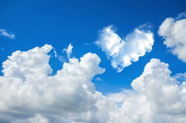 Wall Mural - romantic heart cloud abstract blue sky and cloud nature backgrou