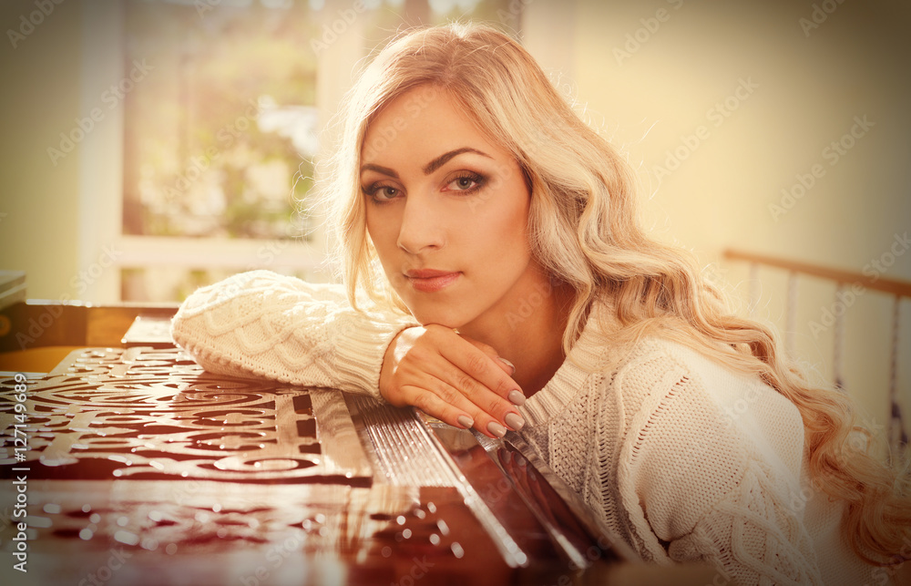 Beautiful woman at piano