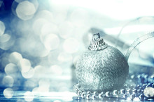 The Silver Christmas Ball Decorations With Abstract Silver Bokeh