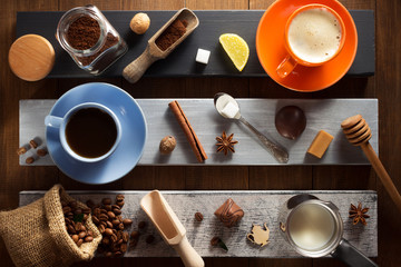 Wall Mural - cup of coffee and ingredients on wood