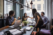 © Maskot - Happy businesswomen holding hands in meeting at creative office