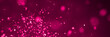 glitter banner: festive star-shaped glitter in shades of pink with bokeh effect in front of a dark background